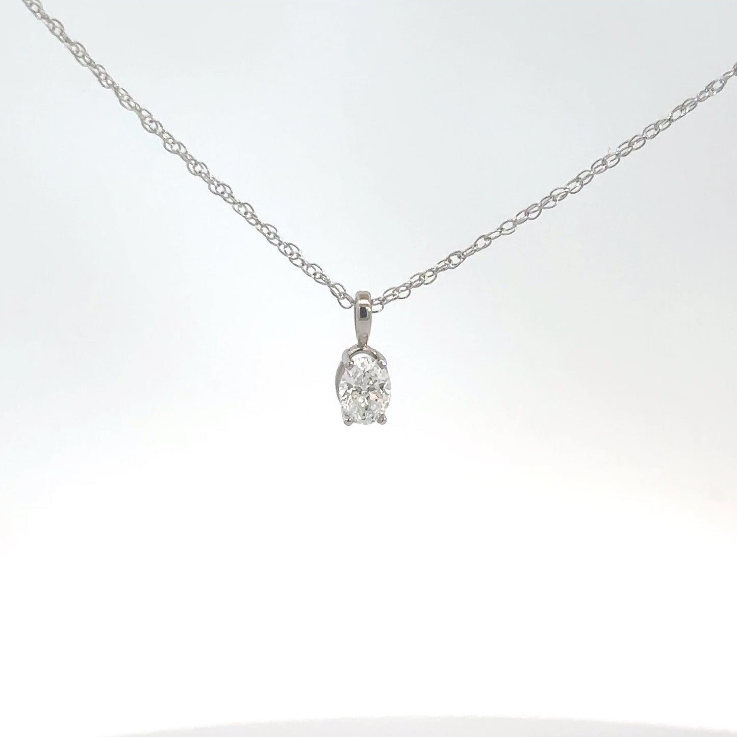 14k White Gold .50cttw Diamond Oval Pendant
