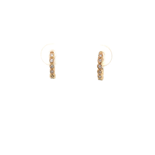 Lady's 14k Yellow Gold Diamond Huggie Earrings .09ctts