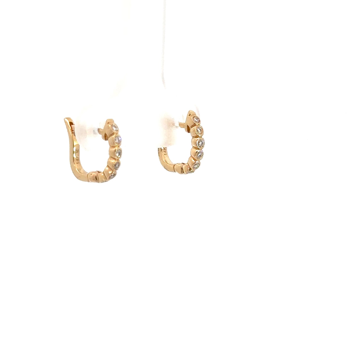 Lady's 14k Yellow Gold Diamond Huggie Earrings .09ctts