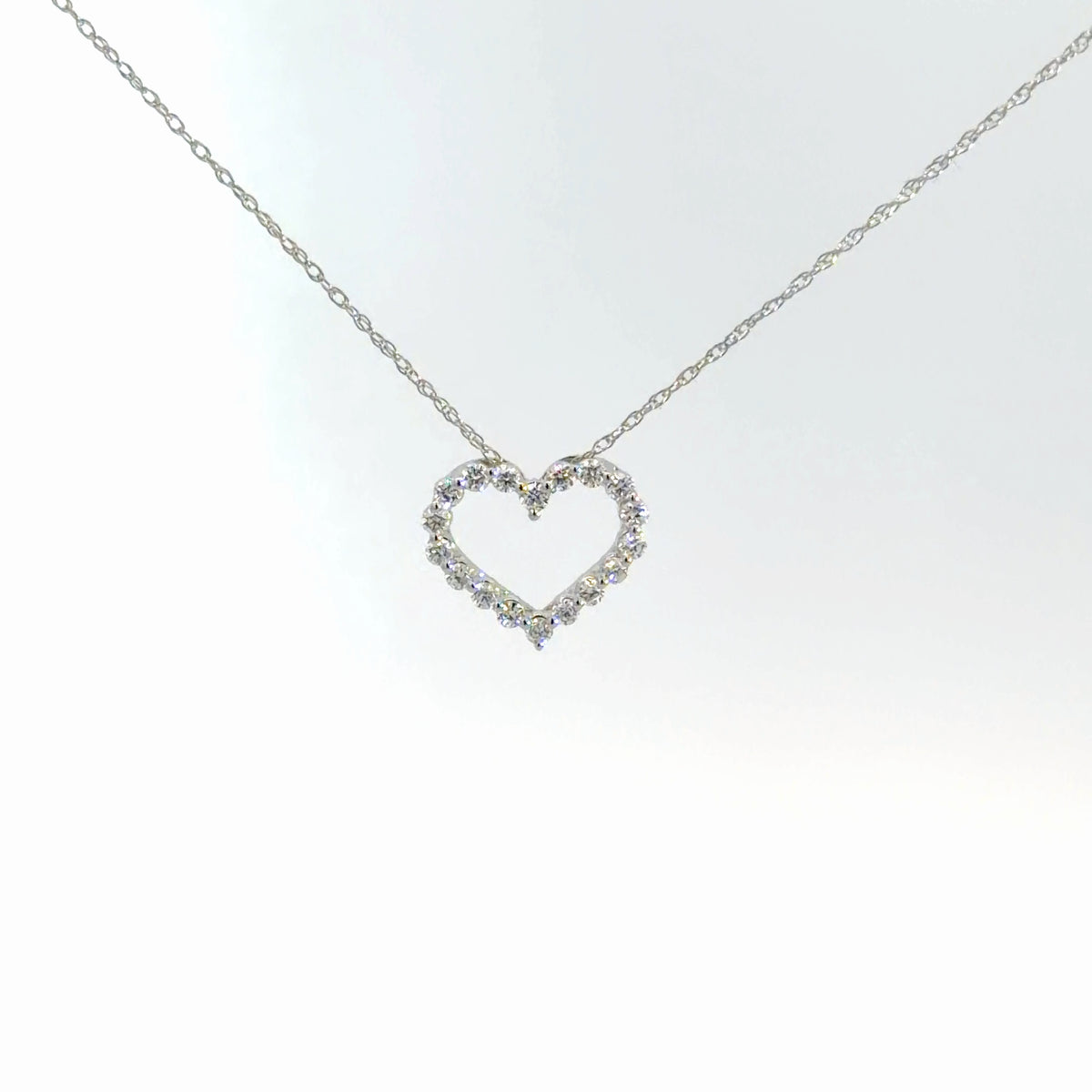 14k White Gold Diamond Heart Pendant 1/4cttw