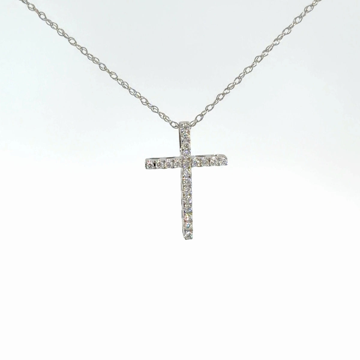 14k White Gold Diamond Cross 1/8cttw