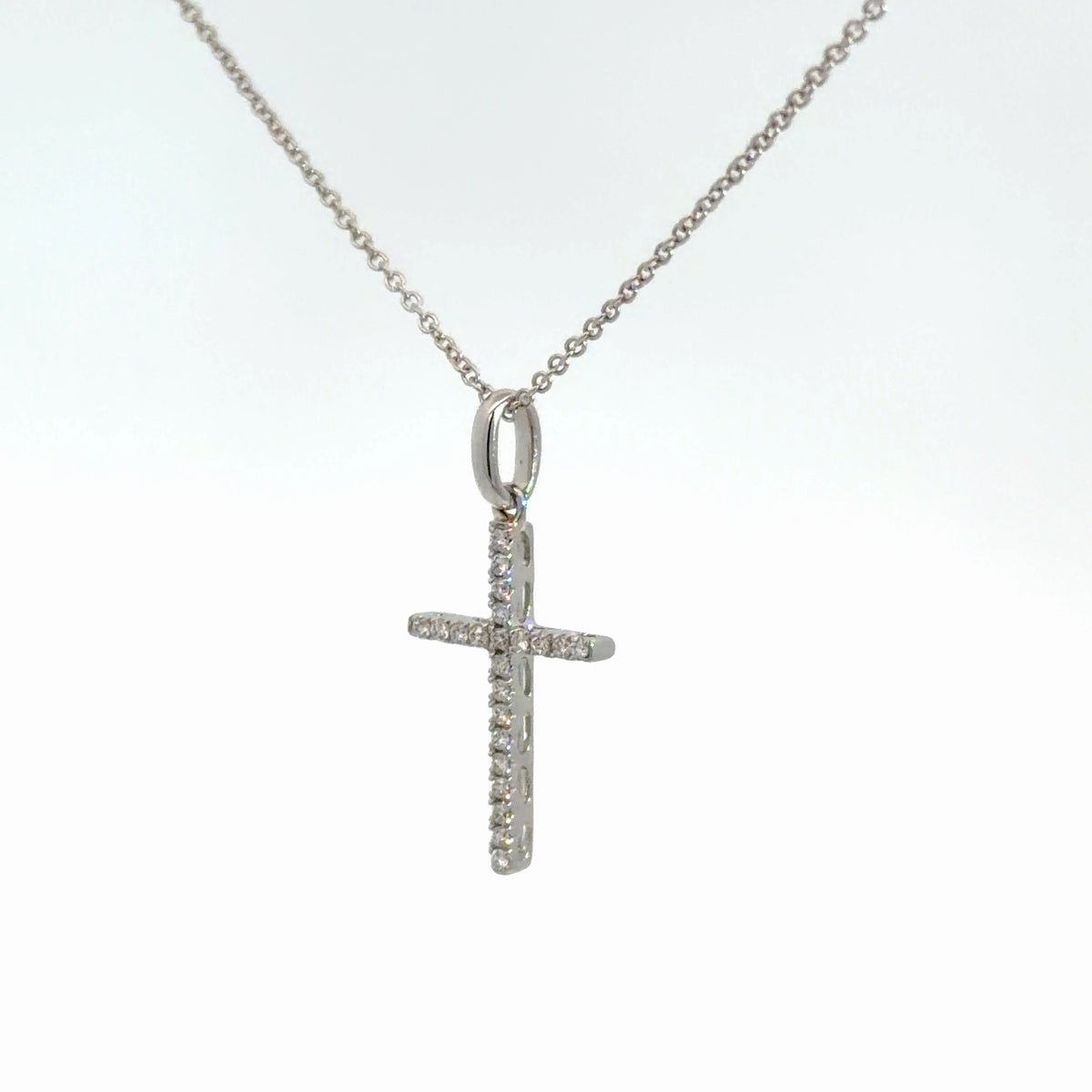 14k White Gold Diamond Cross 1/8cttw