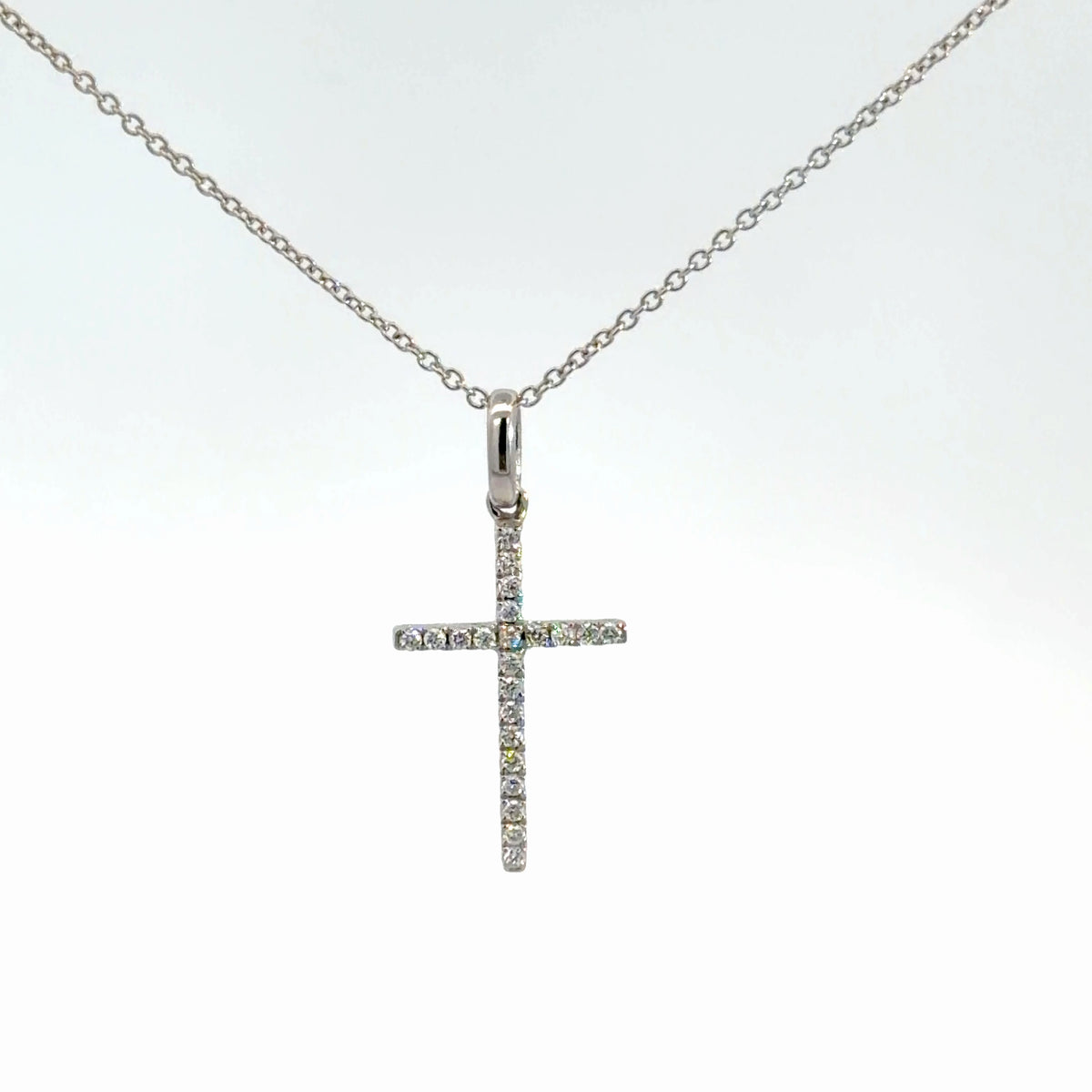 14k White Gold Diamond Cross 1/8cttw