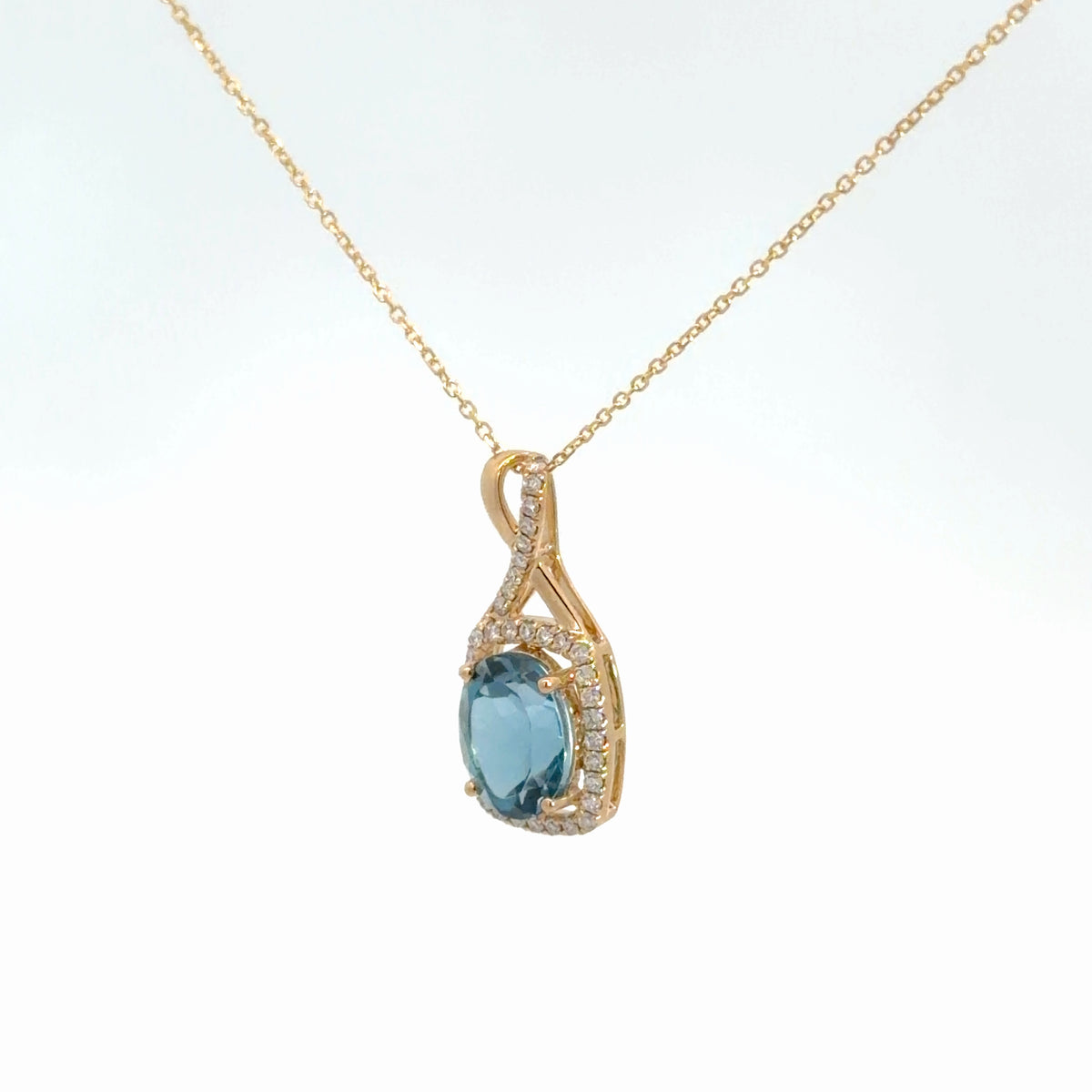 14k Yellow Gold Blue Topaz Pendant
