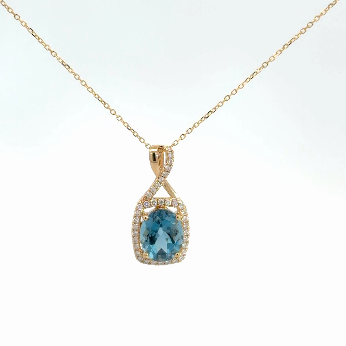 14k Yellow Gold Blue Topaz Pendant