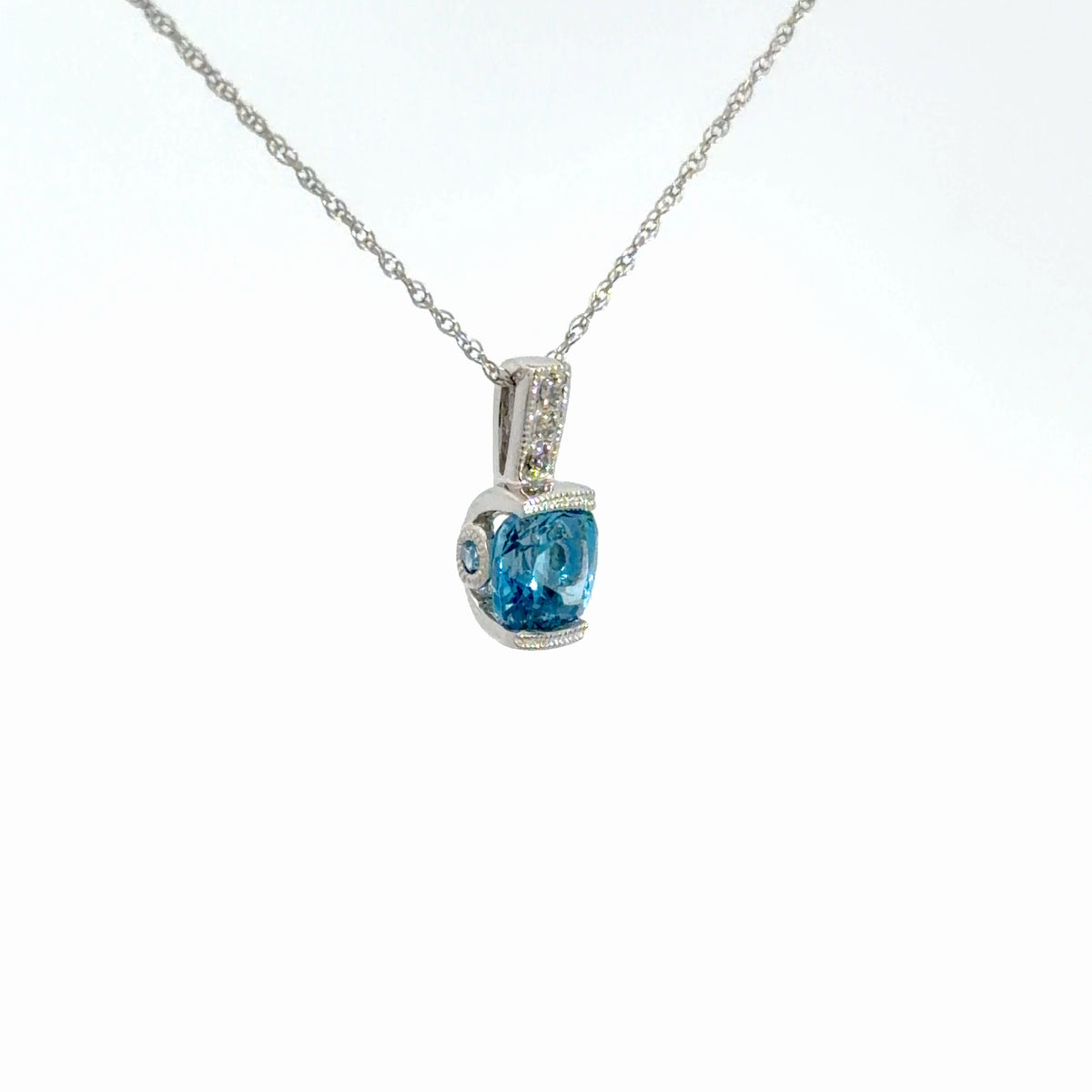 10K Blue Topaz & Diamond Pendant