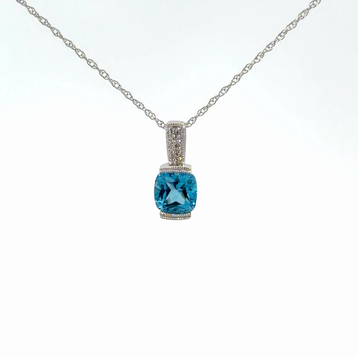 10K Blue Topaz & Diamond Pendant