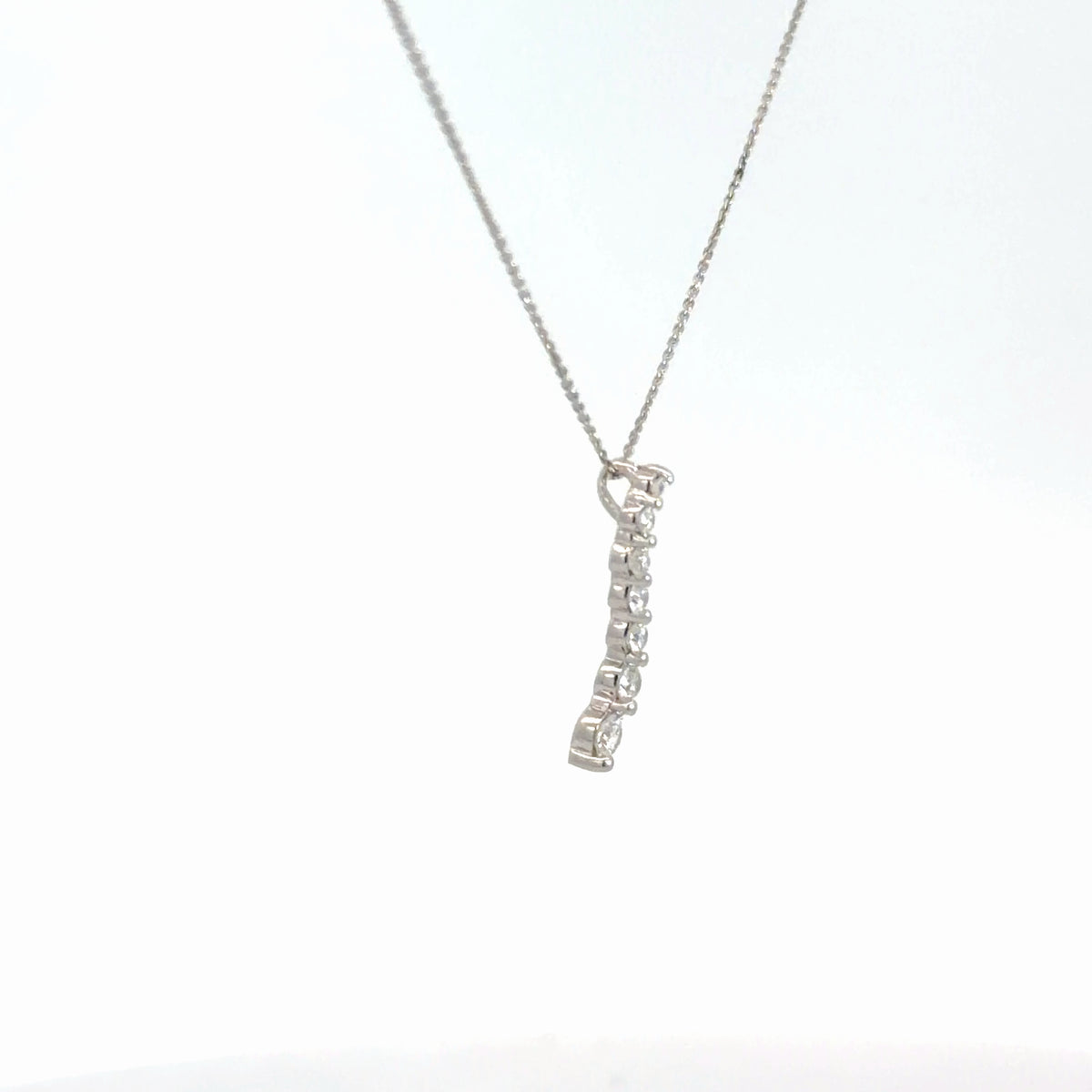 14k White Gold Diamond Journey Pendant 1/4cttw