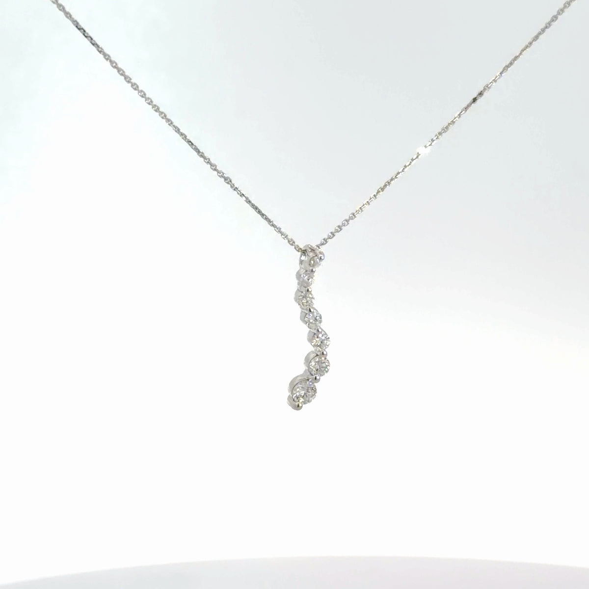 14k White Gold Diamond Journey Pendant 1/4cttw