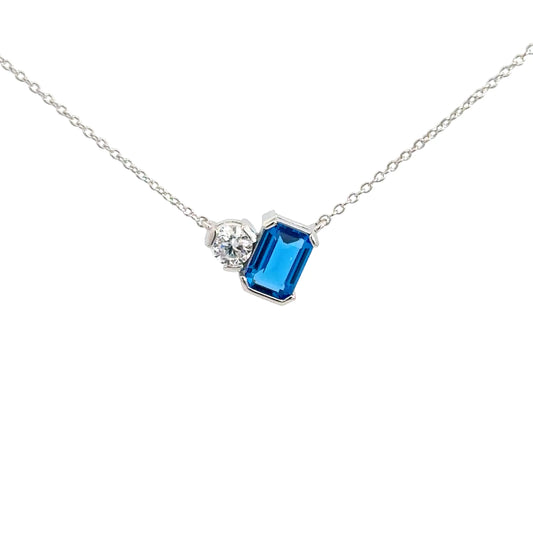 Sterling Silver Simulated Blue Topaz & Simulated Diamond Pendant