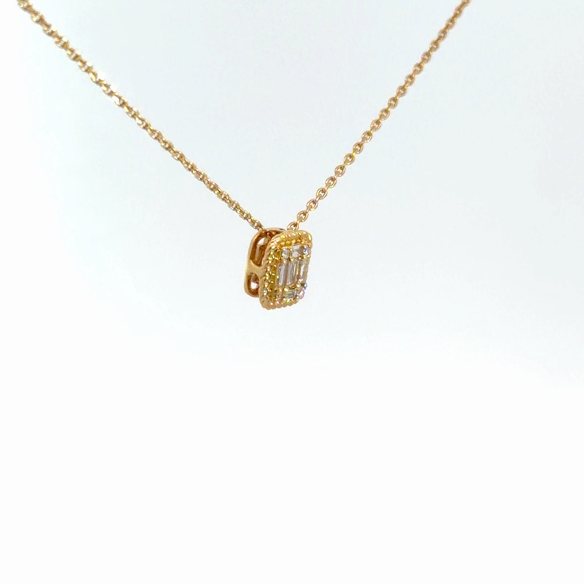 14k Yellow Gold Round & Baguette Diamond Pendant .12cttw