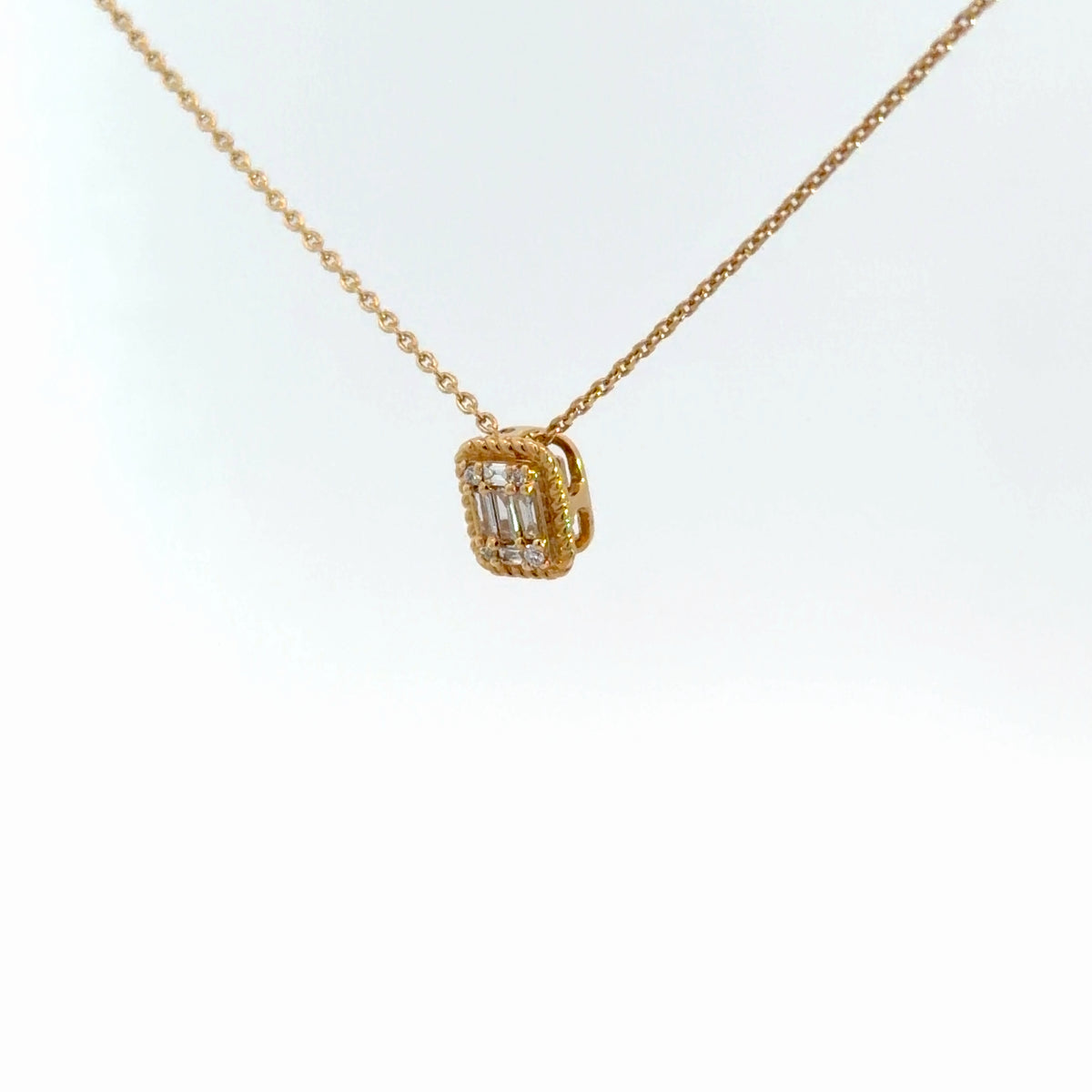 14k Yellow Gold Round & Baguette Diamond Pendant .12cttw